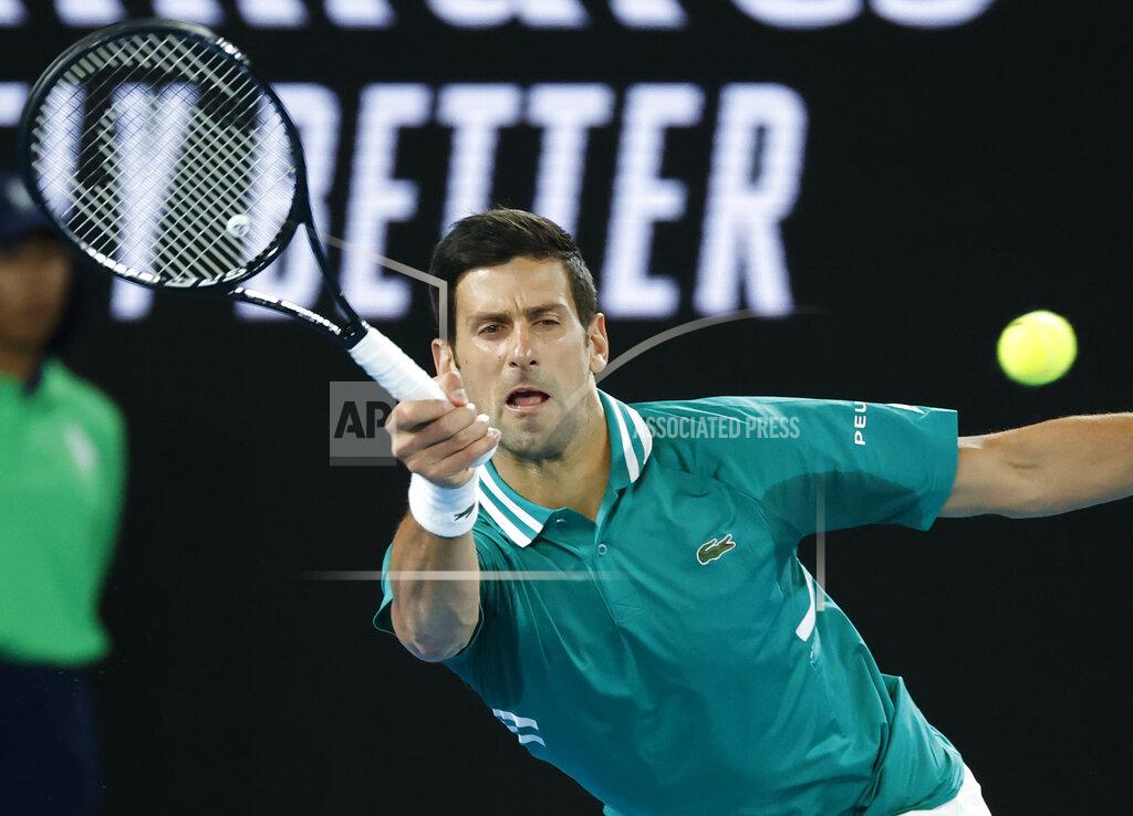 Rick Rycroft Serbia's Novak Djokovic makes a forehand return to France's Jeremy Chardy during their first round match at the Australian Open tennis championship in Melbourne, Australia, Monday, Feb. 8, 2021.(AP Photo/Rick Rycroft)