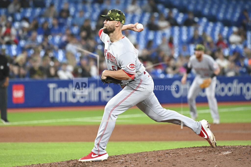 Jon Blacker Cincinnati Reds' Hunter Strickland pitches against the Toronto Blue Jays during the seventh inning of a baseball game Friday, May 20, 2022, in Toronto. (Jon Blacker/The Canadian Press via AP)
