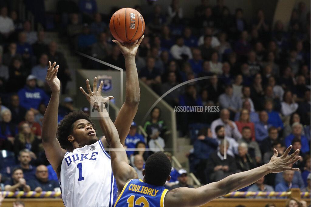 Gerry Broome Duke center Vernon Carey Jr. (1) shoots while Pittsburgh forward Abdoul Karim Coulibaly (12) defends during the second half of an NCAA college basketball game in Durham, N.C., Tuesday, Jan. 28, 2020. (AP Photo/Gerry Broome)