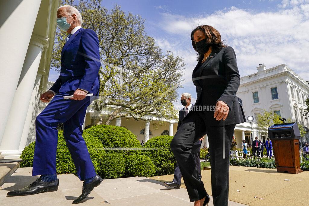 Andrew Harnik President Joe Biden, accompanied by Vice President Kamala Harris, right, and Attorney General Merrick Garland, second from right, departs after speaking about gun violence prevention in the Rose Garden at the White House, Thursday, April 8, 2021, in Washington. (AP Photo/Andrew Harnik)