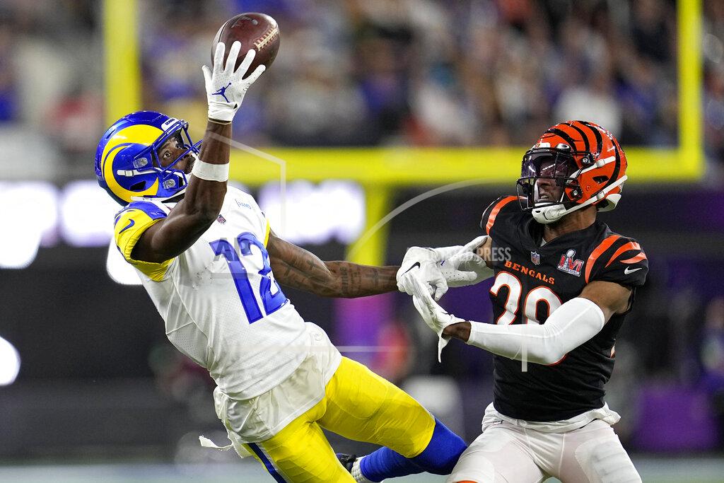 Los Angeles Rams wide receiver Van Jefferson (12) can't make the catch against Cincinnati Bengals cornerback Eli Apple during the second half of the NFL Super Bowl 56 football game Sunday, Feb. 13, 2022, in Inglewood, Calif. (AP Photo/Marcio Jose Sanchez)