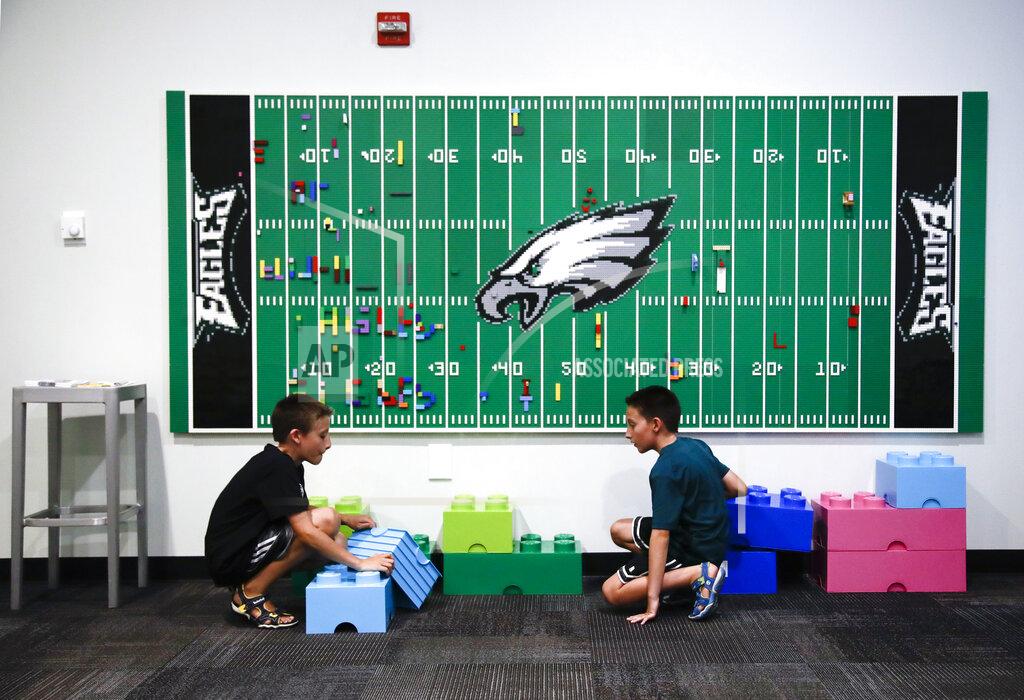 Matt Rourke In this Thursday, Aug. 22, 2019, photo, 10-year-old twin brothers Ryan left, and Jack Ykoruk, play in the Lincoln Financial Field sensory room before a preseason NFL football game between the Philadelphia Eagles and the Baltimore Ravens in Philadelphia. (AP Photo/Matt Rourke)