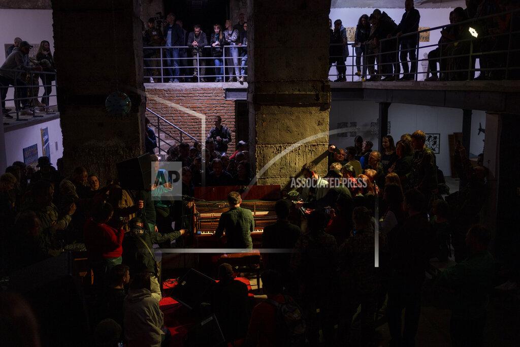 Bernat Armangue Ukrainian singer Svyatoslav Vakarchuk sings during "The music of the resistance" concert at an art gallery in Kharkiv, east Ukraine, Saturday, May 14, 2022. (AP Photo/Bernat Armangue)