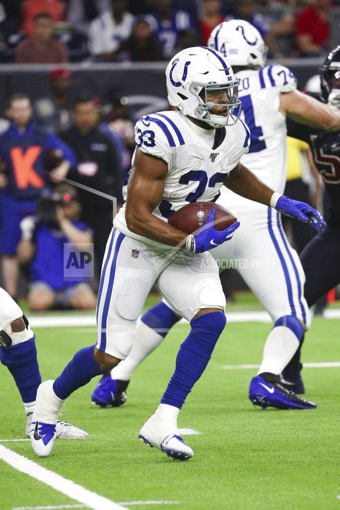Margaret Bowles Indianapolis Colts running back Jonathan Williams (33) carries the ball in an NFL game against the Houston Texans, Thursday, Nov. 21, 2019 in Houston. The Texans defeated the Colts 20-17. (Margaret Bowles via AP)