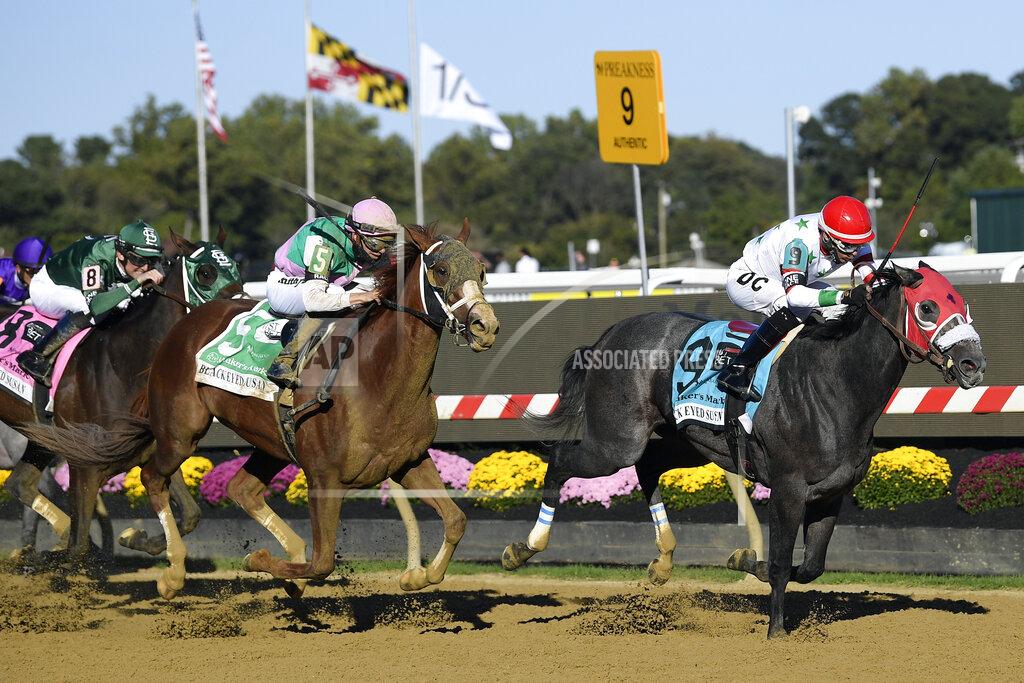 Nick Wass Miss Marissa (9), with Daniel Centeno aboard, runs down the track to win the Black Eyed Susan horse race at Pimlico Race Course, Saturday, Oct. 3, 2020, in Baltimore. (AP Photo/Nick Wass)
