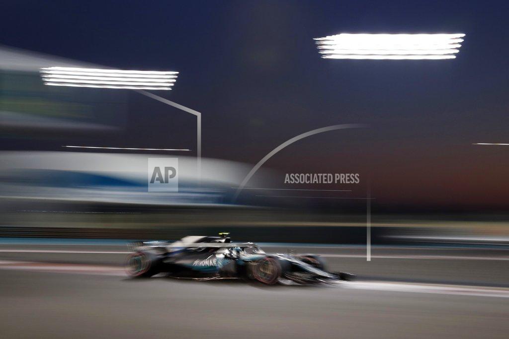 Hassan Ammar Mercedes driver Valtteri Bottas of Finland steers his car during the second free practice at the Yas Marina racetrack in Abu Dhabi, United Arab Emirates, Friday, Nov. 23, 2018. The Emirates Formula One Grand Prix will take place on Sunday. (AP Photo/Hassan Ammar)