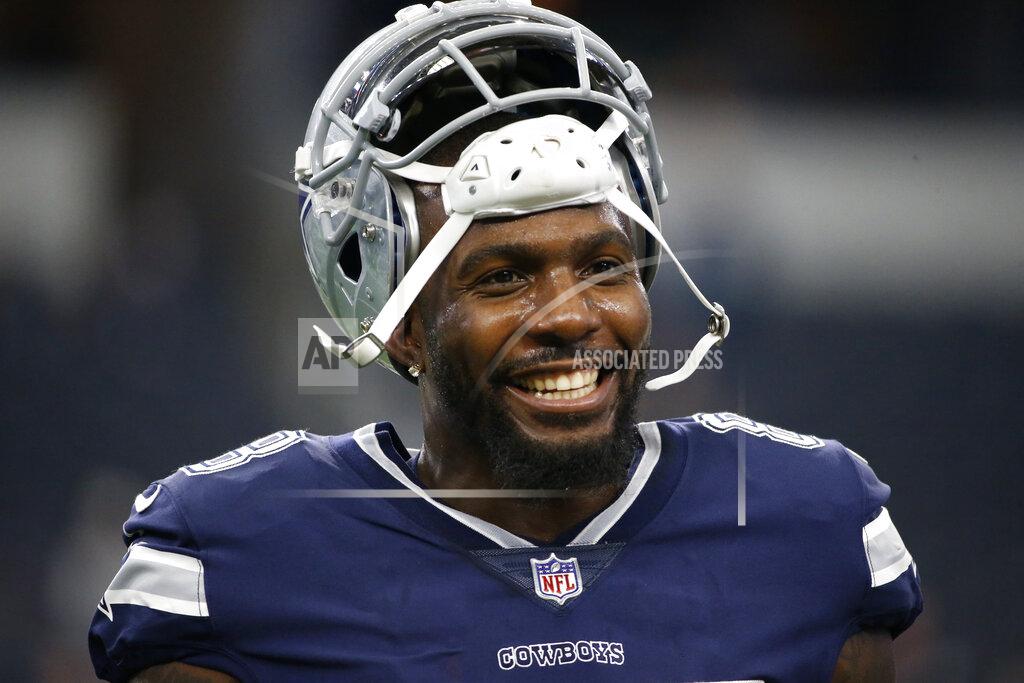 FILE - In this Nov. 23, 2017, file photo, Dallas Cowboys' Dez Bryant warms up before an NFL football game against the Los Angeles Chargers in Arlington, Texas. Former Cowboys receiver Dez Bryant is one step closer to playing in the NFL again. The 31-year-old Bryant signed with the Baltimore Ravens on Tuesday, Oct. 27, 2020 and has been assigned to the practice squad. (AP Photo/Ron Jenkins, File)