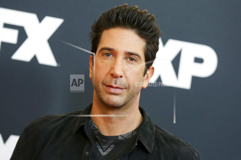 Rich Fury FILE - In this Jan. 16, 2016 file photo, David Schwimmer arrives at the 2016 FX Winter TCA in Pasadena, Calif. Schwimmer turns 55 on Nov. 2. (Photo by Rich Fury/Invision/AP, File)