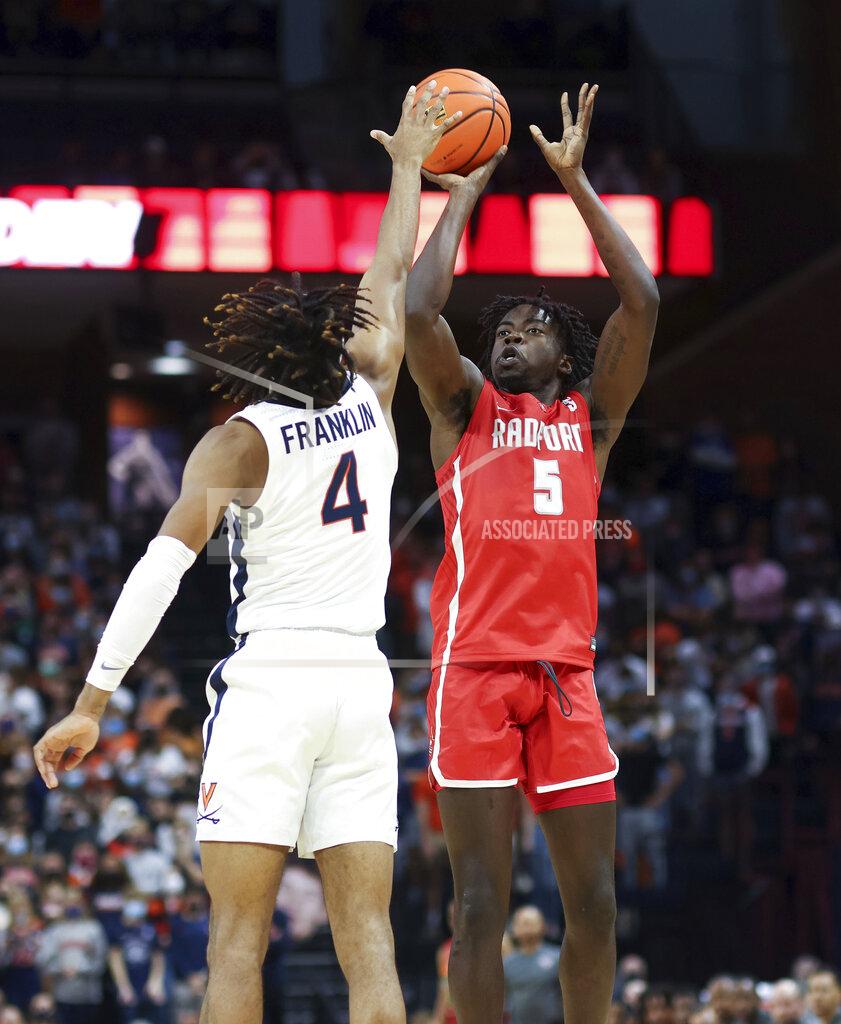 Andrew Shurtleff RADFORD'S RASHUN WILLIAMS (5) NOT COPPIN STATE FORWARD NATHANIEL STOKES (5) - Radford's Rashun Williams (5) shoots over Virginia guard Armaan Franklin (4) during an NCAA college basketball game in Charlottesville, Va., Friday, Nov. 12, 2021. (AP Photo/Andrew Shurtleff)