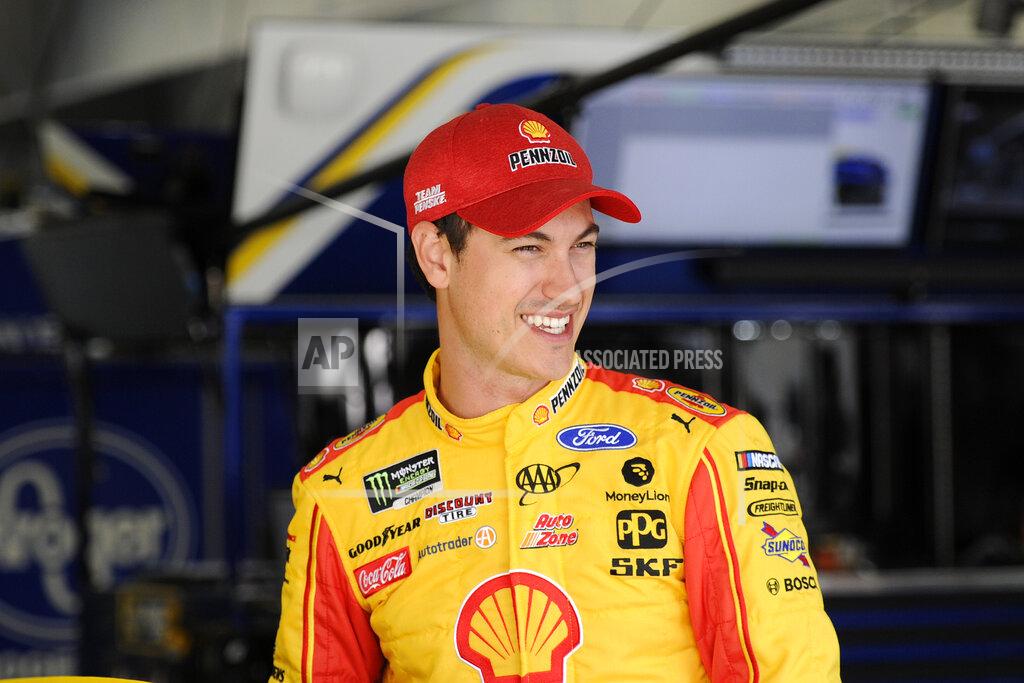 Mike Mccarn Joey Logano smiles during practice for Sunday's NASCAR Cup Series auto race at Charlotte Motor Speedway in Concord, N.C., Saturday, Sept. 28, 2019. (AP Photo/Mike McCarn)