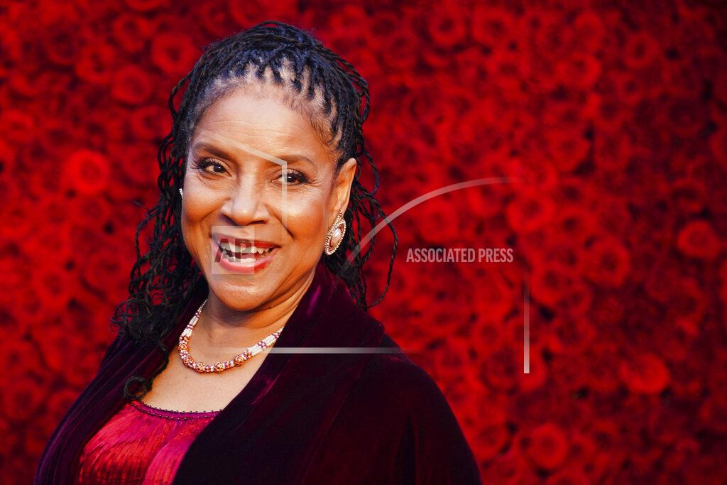 Elijah Nouvelage FILE - In this Oct. 5, 2019, file photo, Phylicia Rashad poses for a photo on the red carpet at the grand opening of Tyler Perry Studios in Atlanta. Several historically Black colleges and universities will receive more than $650,000 in grants to preserve their campuses as part of a new initiative announced Tuesday, Feb. 16, 2021. The initiative is a “brilliant step forward” in addressing the history of systemic inequity HBCUs face, said Rashad, co-chair of the initiative and the iconic actress, singer and stage director known for her role as Clair Huxtable on “The Cosby Show.” (Photo by Elijah Nouvelage/Invision/AP, File)