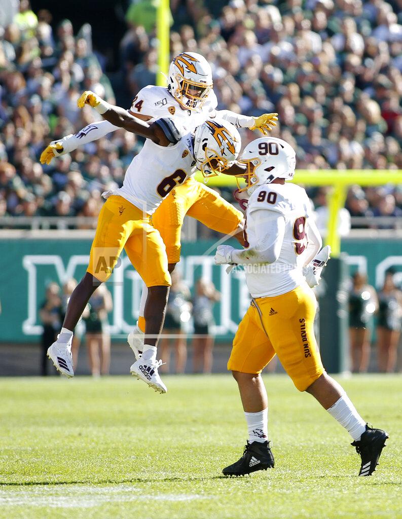 Al Goldis Arizona State's Chase Lucas, left, Timarcus Davis, center, and Jermayne Lole, right, celebrate after Michigan State missed a field goal during the second quarter of an NCAA college football game Saturday, Sept. 14, 2019, in East Lansing, Mich. (AP Photo/Al Goldis)