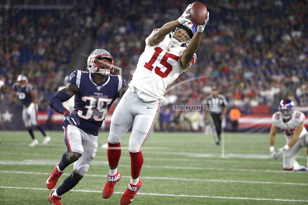 Elise Amendola New York Giants wide receiver Golden Tate (15) catches a pass in front of New England Patriots defensive back Keion Crossen (35) in the first half of an NFL preseason football game, Thursday, Aug. 29, 2019, in Foxborough, Mass. (AP Photo/Elise Amendola)