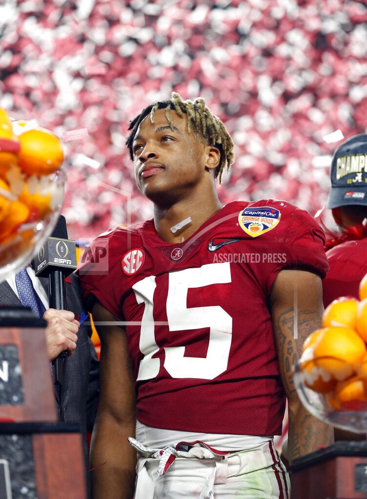 Wilfredo Lee Alabama defensive back Xavier McKinney (15) stands next to the MVP trophy for the defensive player of the game during the Orange Bowl NCAA college football game, Sunday, Dec. 30, 2018, in Miami Gardens, Fla. Alabama defeated Oklahoma 45-34. (AP Photo/Wilfredo Lee)
