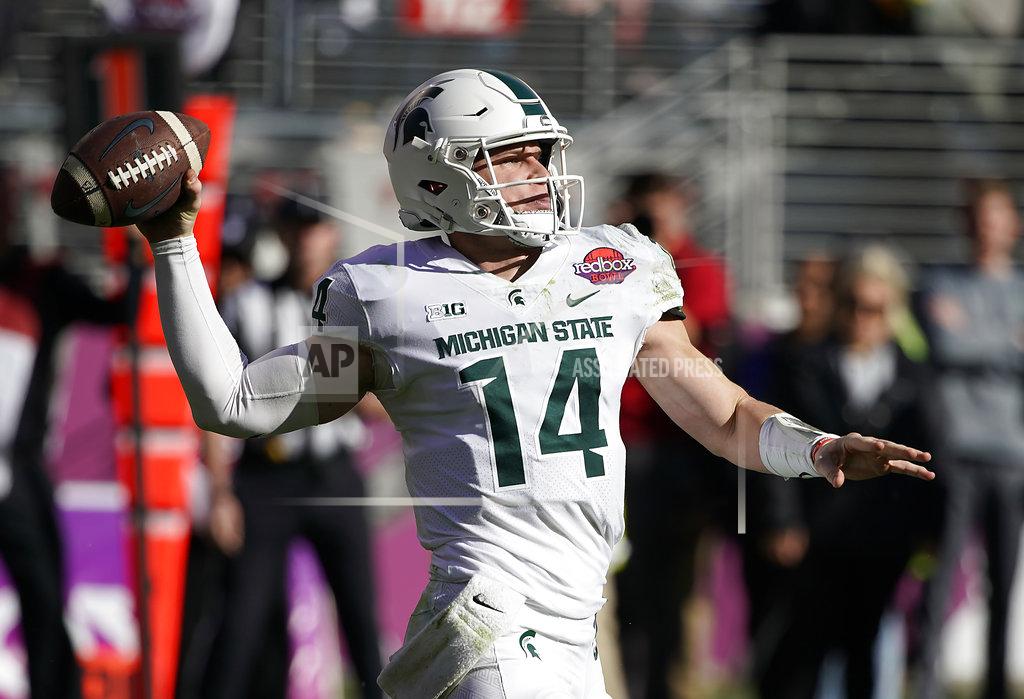 Tony Avelar Michigan State quarterback Brian Lewerke (14) throws a pass against Oregon during the first half of the Redbox Bowl NCAA college football game Monday, Dec. 31, 2018, in Santa Clara, Calif. (AP Photo/Tony Avelar)