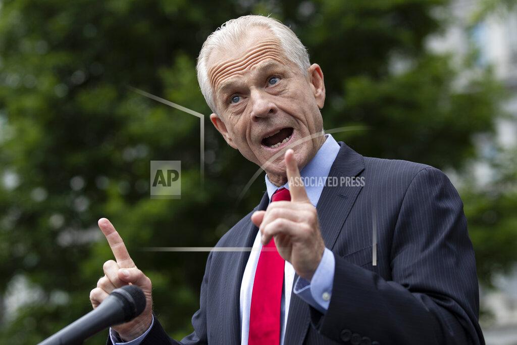 White House trade adviser Peter Navarro speaks with reporters at the White House, Thursday, June 18, 2020, in Washington. (AP Photo/Alex Brandon)
