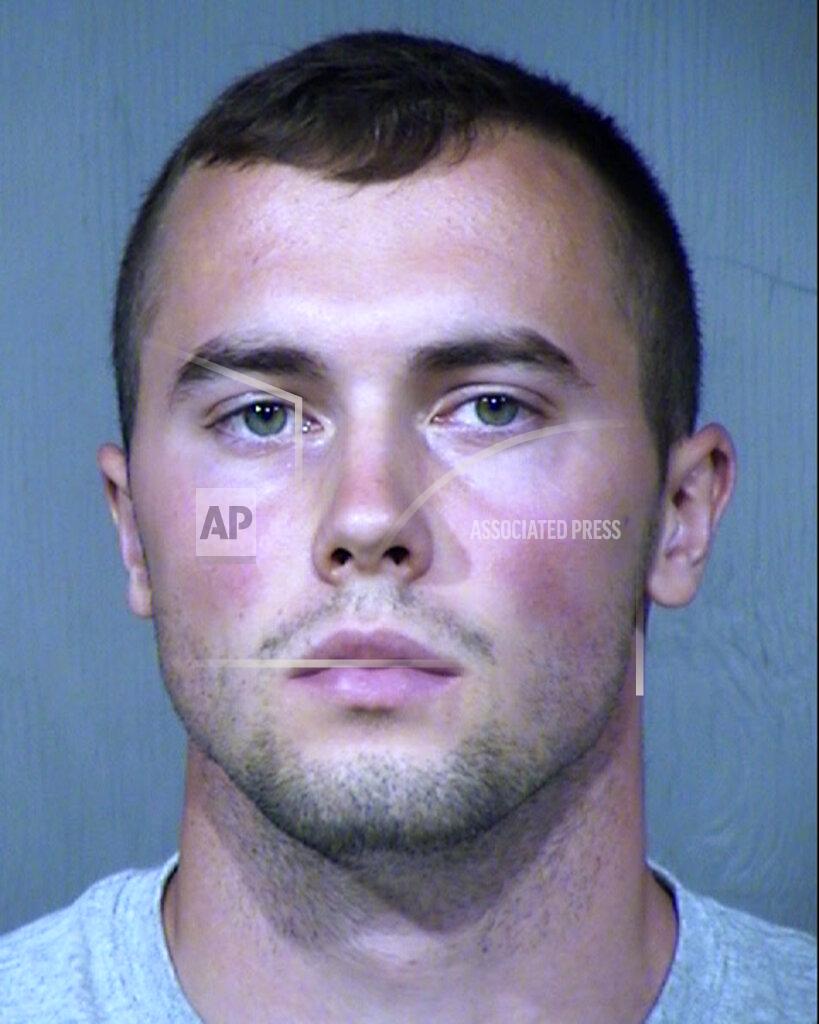 Uncredited FILE - This file photo provided by the Maricopa County Sheriff's Office shows Mark Gooch. The attorney for Gooch, a U.S. Air Force airman accused of kidnapping and killing a Mennonite woman is arguing to limit evidence from being allowed at trial that prosecutors say ties him to the crime. (Maricopa County Sheriff's Office via AP)