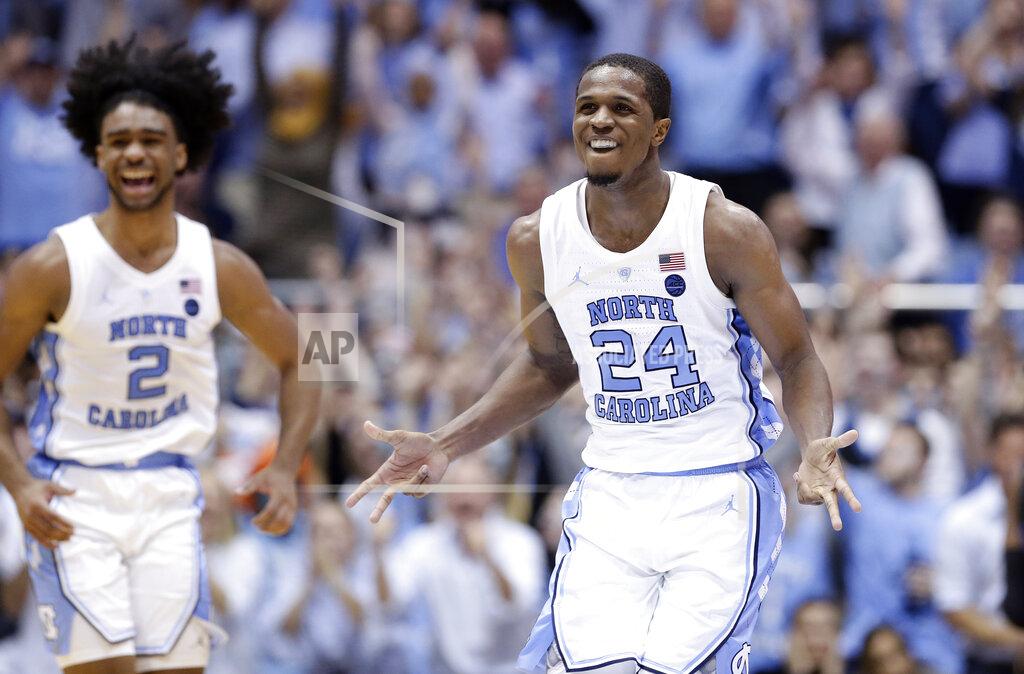 Gerry Broome North Carolina's Kenny Williams (24) and Coby White (2) react following a play against Duke during the second half of an NCAA college basketball game in Chapel Hill, N.C., Saturday, March 9, 2019. North Carolina won 79-70. (AP Photo/Gerry Broome)