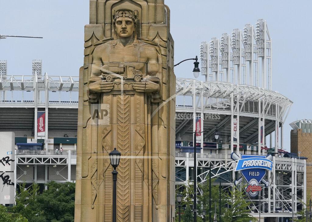 Tony Dejak A guardian rests on the Hope Memorial Bridge within site of Progressive Field, Friday, July 23, 2021, in Cleveland. Cleveland's new name was inspired by two large landmark stone edifices near the downtown ballpark, referred to as traffic guardians, on the Hope Memorial Bridge over the Cuyahoga River. The team's colors will remain the same, and the new Guardians' new logos will incorporate some of the architectural features of the bridge. (AP Photo/Tony Dejak)