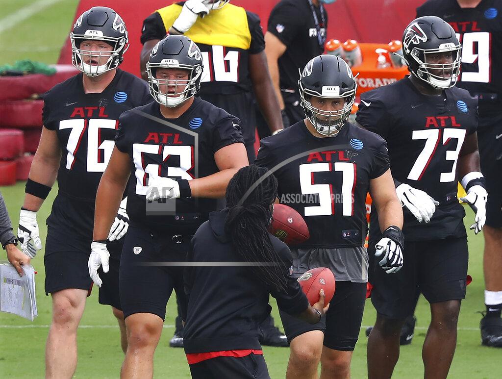 Curtis Compton Atlanta Falcons offensive lineman tackle Kaleb McGary, from left, guard Chris Lindstrom , center Alex Mack, and tackle Matt Gono take the line during an NFL football training camp practice Saturday, Aug. 15, 2020, in Flowery Branch, Ga. (Curtis Compton/Atlanta Journal-Constitution via AP)