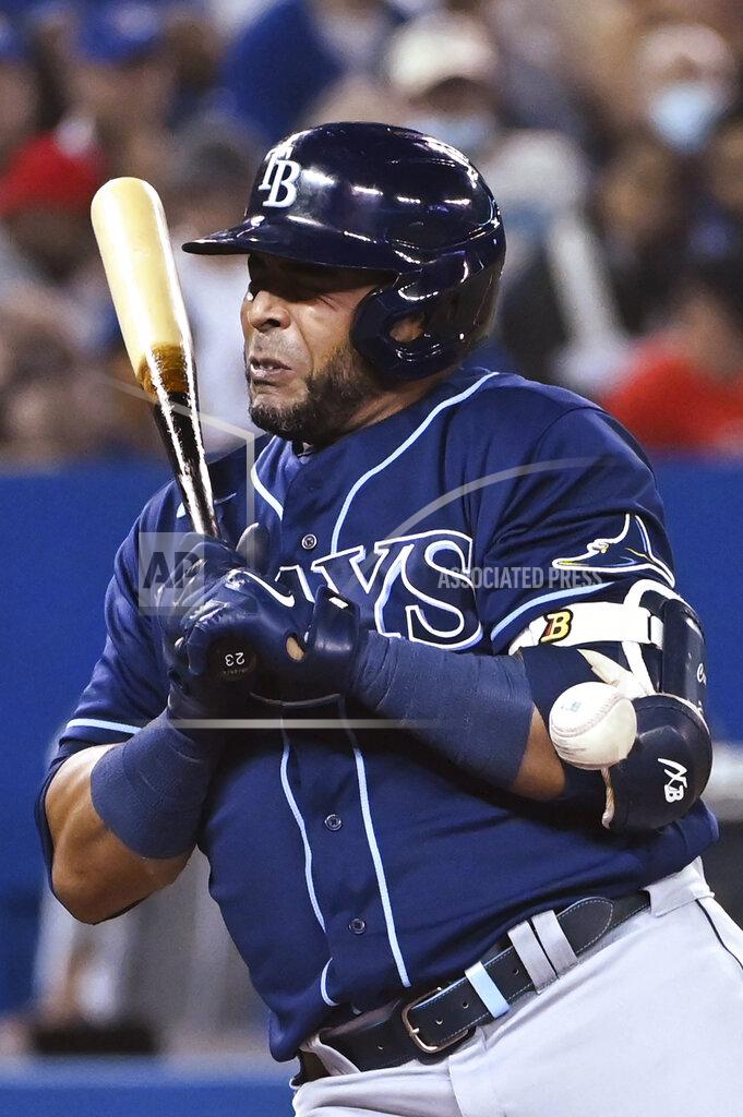 Jon Blacker Tampa Bay Rays' Nelson Cruz is hit by a pitch from Toronto Blue Jays pitcher Jose Berrios during the sixth inning of a baseball game Tuesday, Sept. 14, 2021, in Toronto. (Jon Blacker/The Canadian Press via AP)