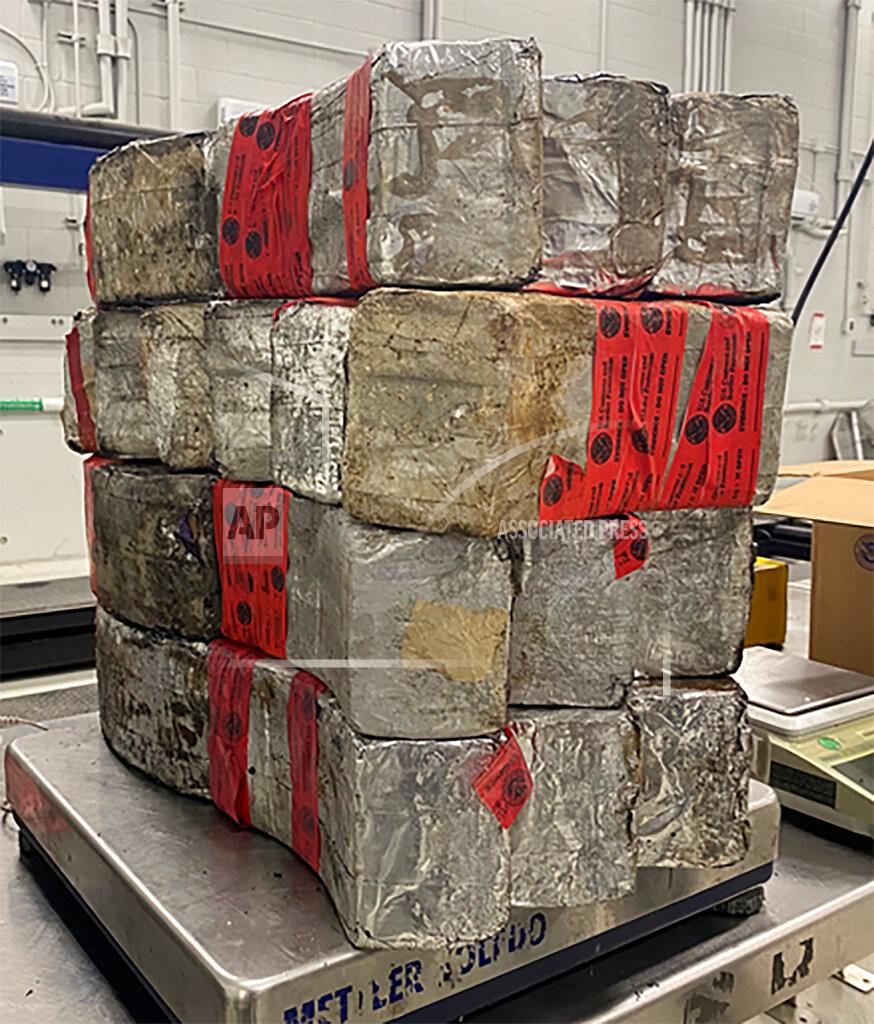 Uncredited This undated photo provided by the U.S. Customs and Border Protection shows seized drug bundles containing 132 pounds of methamphetamine on display from Feb. 25, 2021, at the Laredo port of entry. The drugs were concealed in a vehicle driven by 23-year-old U.S. citizen traveling from Mexico. Since the start of the coronavirus pandemic, an increasing number of U.S. citizens have been apprehended while they have tried to smuggle illegal drugs at the Southwest border. (U.S. Customs and Border Protection via AP)