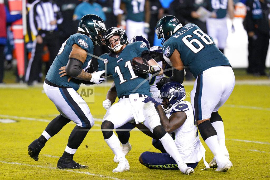 Chris Szagola Philadelphia Eagles' Carson Wentz (11) is sacked by Seattle Seahawks' Benson Mayowa (95) during the second half of an NFL football game, Monday, Nov. 30, 2020, in Philadelphia. (AP Photo/Chris Szagola)