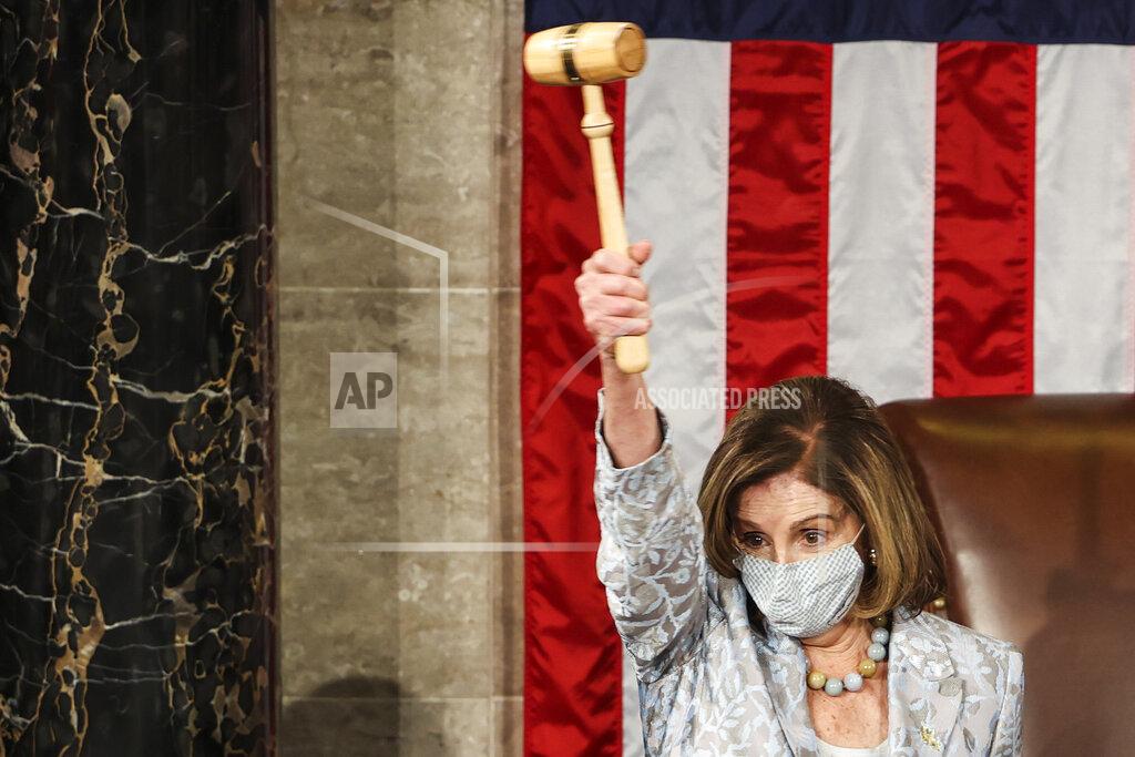 Tasos Katopodis House Speaker Nancy Pelosi waves the gavel during opening day of the 117th Congress at the U.S. Capitol in Washington, Sunday, Jan. 3, 2021. (Tasos Katopodis/Pool via AP)