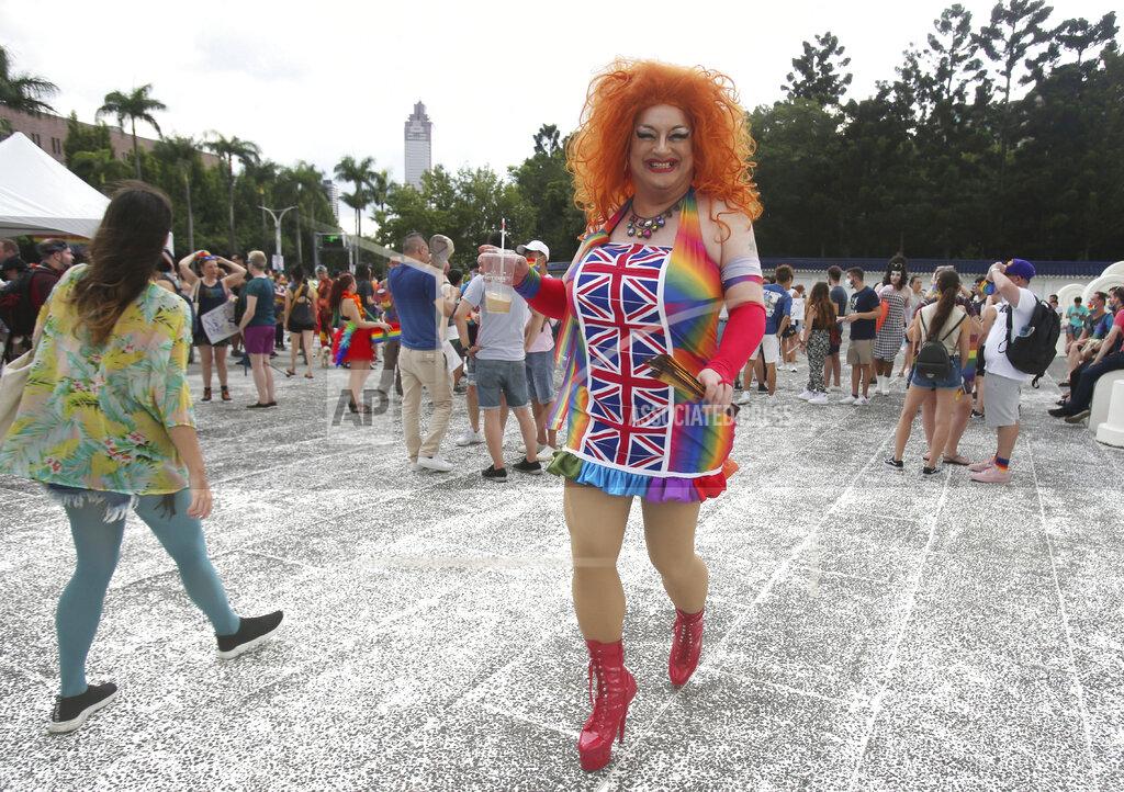 Chiang Ying-Ying Participants march during the "Taiwan Pride March for the World!" at Liberty Square at the CKS Memorial Hall in Taipei, Taiwan, Sunday, June 28, 2020. This year marks the first Gay Pride march in Chicago 1970, and due to the COVID-19 lockdown, Taiwan is one of the very few countries to host the world's only physical Gay Pride. (AP Photo/Chiang Ying-ying)