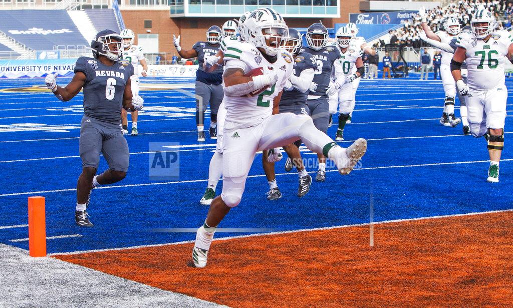 Ohio running back Julian Ross (2) high-steps into the end zone, scoring against Nevada in the Famous Idaho Potato Bowl NCAA college football game Friday, Jan. 3, 2020, in Boise, Idaho. (Darin Oswald/Idaho Statesman via AP)