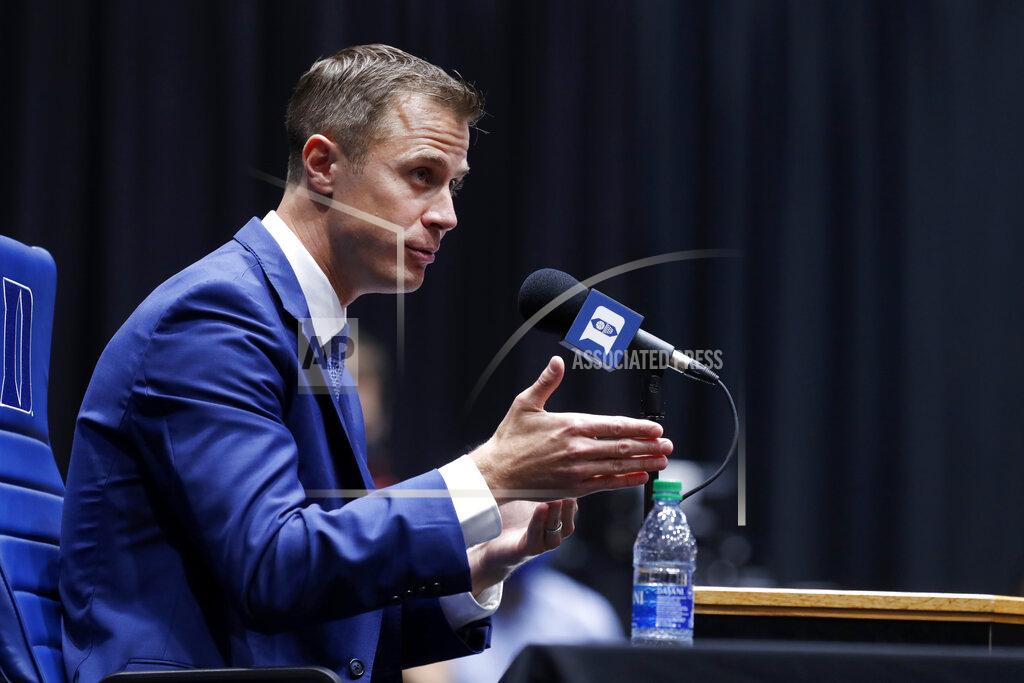 Ethan Hyman Jon Scheyer speaks during an NCAA college basketball press conference at Cameron Indoor Stadium in Durham, N.C., Friday, June 4, 2021. Scheyer will spend the upcoming year in his role as associate head coach as coach Mike Krzyzewski chases one more championship in a Hall of Fame career. Then it’s up to the 33-year-old Scheyer to take over ahead of the 2022-23 season in the program’s first coaching change in more than four decades. (Ethan Hyman/The News & Observer via AP)