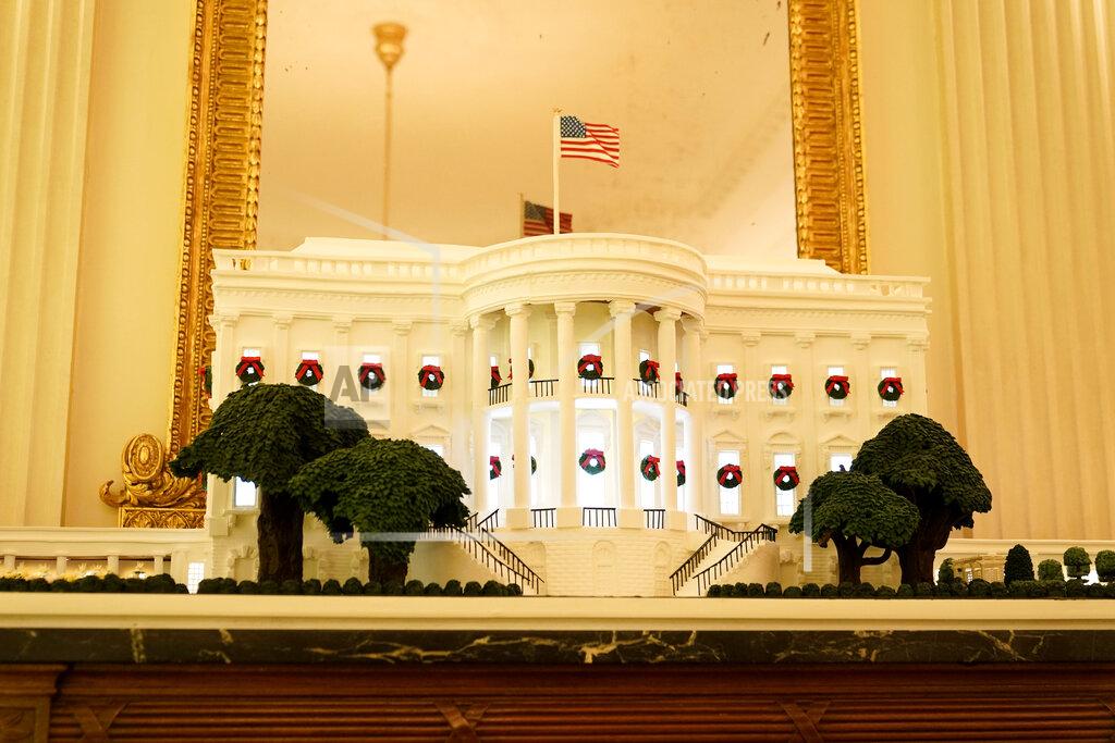 Patrick Semansky A gingerbread White House stands in the State Dining Room during the 2020 Christmas preview at the White House, Monday, Nov. 30, 2020, in Washington. (AP Photo/Patrick Semansky)