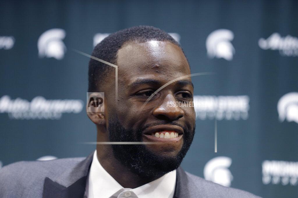 Al Goldis Former Michigan State and current Golden State Warriors player Draymond Green talks to reporters before an NCAA college basketball Tuesday, Dec. 3, 2019, in East Lansing, Mich. (AP Photo/Al Goldis)