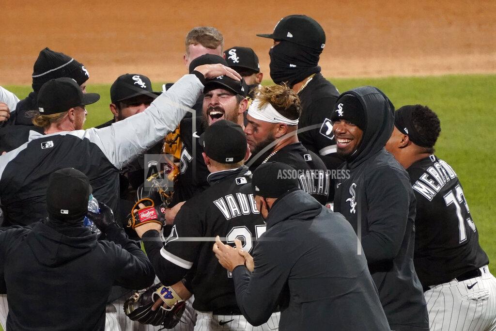 David Banks Chicago White Sox starting pitcher Carlos Rodon, center, celebrates his no hitter against the Cleveland Indians with his teammates in a baseball game, Wednesday, April, 14, 2021, in Chicago. (AP Photo/David Banks)