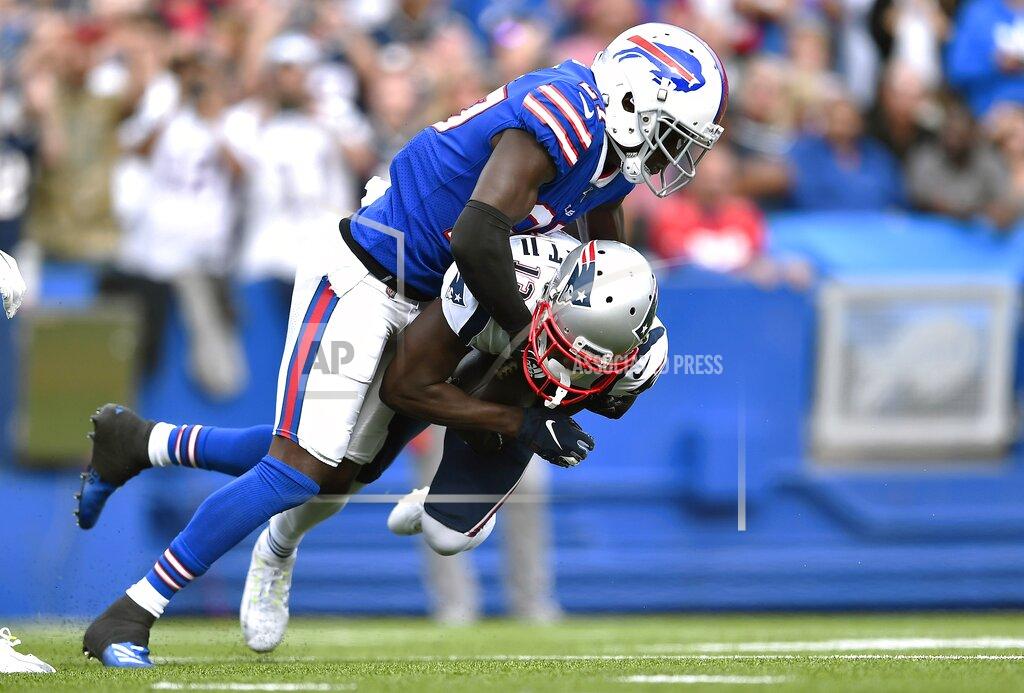Adrian Kraus Buffalo Bills cornerback Tre'Davious White, top, tackles New England Patriots wide receiver Phillip Dorsett in the second half of an NFL football game, Sunday, Sept. 29, 2019, in Orchard Park, N.Y. (AP Photo/Adrian Kraus)
