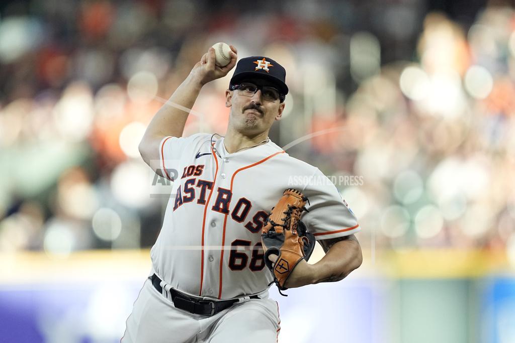 J.P. France throws against the Kansas City Royals during the first inning of a baseball game Saturday, Sept. 23, 2023, in Houston. (AP Photo/David J. Phillip)