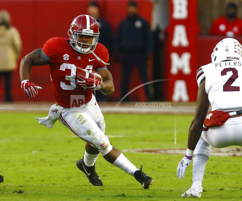 Butch Dill Alabama running back Damien Harris (34) carries the ball during the second half of an NCAA college football game against Mississippi State, Saturday, Nov. 10, 2018, in Tuscaloosa, Ala. (AP Photo/Butch Dill)