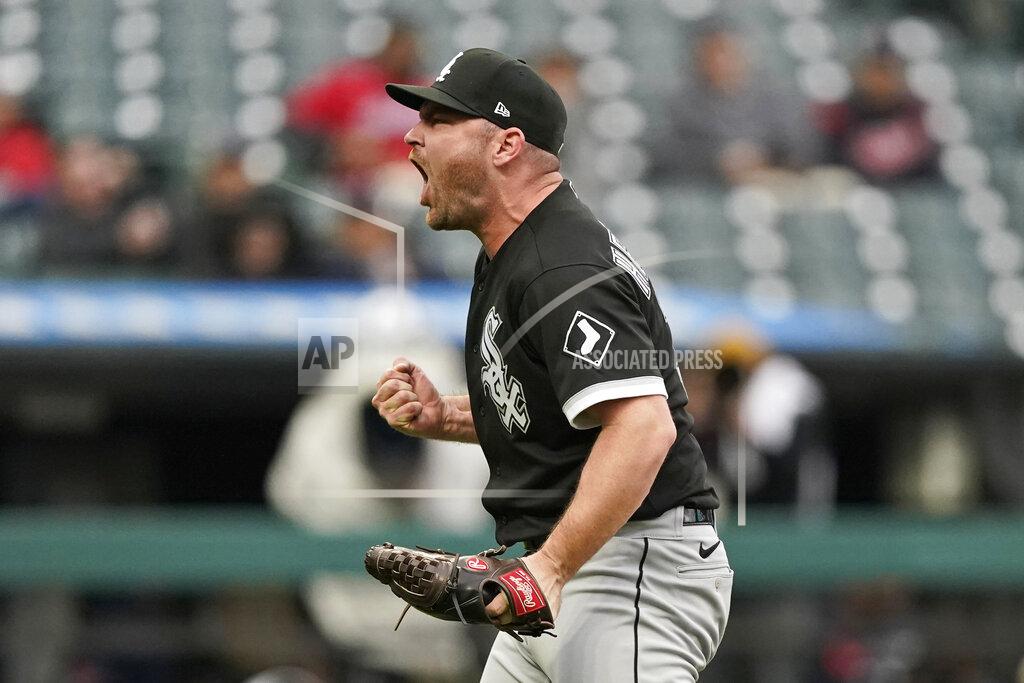 Tony Dejak Chicago White Sox relief pitcher Liam Hendriks celebrates after the White Sox clinched the American League Central title by defeating the Cleveland Indians in the first baseball game of a doubleheader, Thursday, Sept. 23, 2021, in Cleveland. (AP Photo/Tony Dejak)