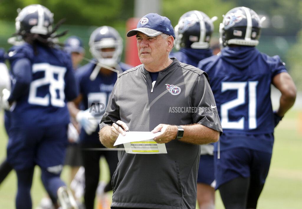 Mark Humphrey FILE- In this May 30, 2018, file photo, Tennessee Titans defensive coordinator Dean Pees watches duringNFL football training facility in Nashville, Tenn. Arthur Smith, the new Atlanta Falcons coach, has started building his staff by hiring offensive coordinator Dave Ragone, defensive coordinator Dean Pees and special teams coach Marquice Williams. (AP Photo/Mark Humphrey, File)