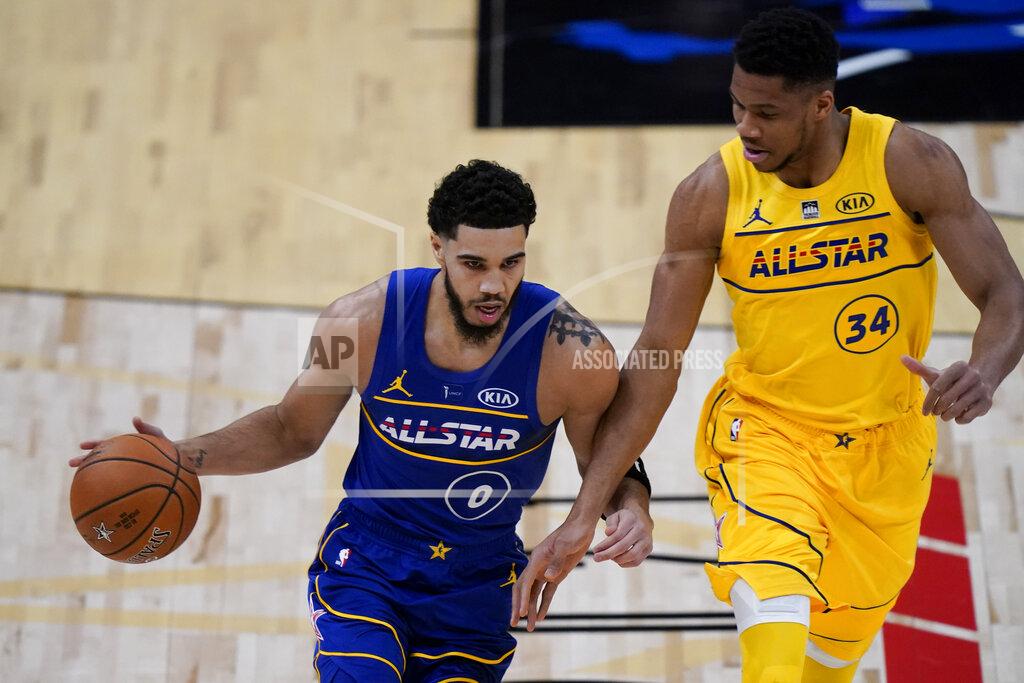 Brynn Anderson Boston Celtics Guard Jayson Tatum drives around Milwaukee Bucks forward Giannis Antetokounmpo during the first half of basketball's NBA All-Star Game in Atlanta, Sunday, March 7, 2021. (AP Photo/Brynn Anderson)