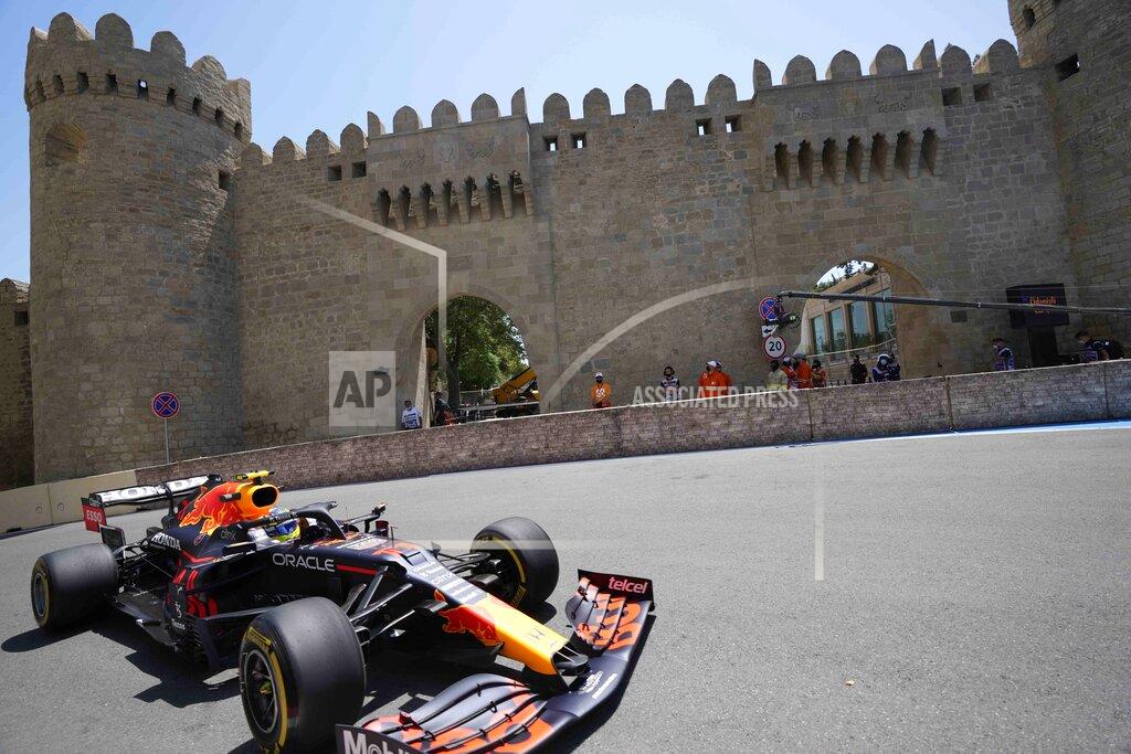 Darko Vojinovic Red Bull driver Sergio Perez of Mexico steers his car during the first free practice at the Baku Formula One city circuit, in Baku, Azerbaijan, Friday, June 4, 2021. The Formula one race will be held on Sunday. (AP Photo/Darko Vojinovic)