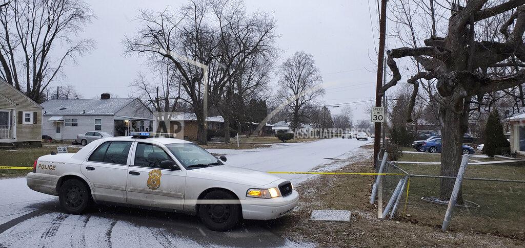 Justin L. Mack Indianapolis Metropolitan Police Department work the scene Sunday, Jan. 24, 2021 in Indianapolis where five people, including a pregnant woman, were shot to death early Sunday inside an Indianapolis home. The pregnant woman who was taken to an area hospital, both she and the unborn child died despite life-saving efforts. (Justin L. Mack/The Indianapolis Star via AP)