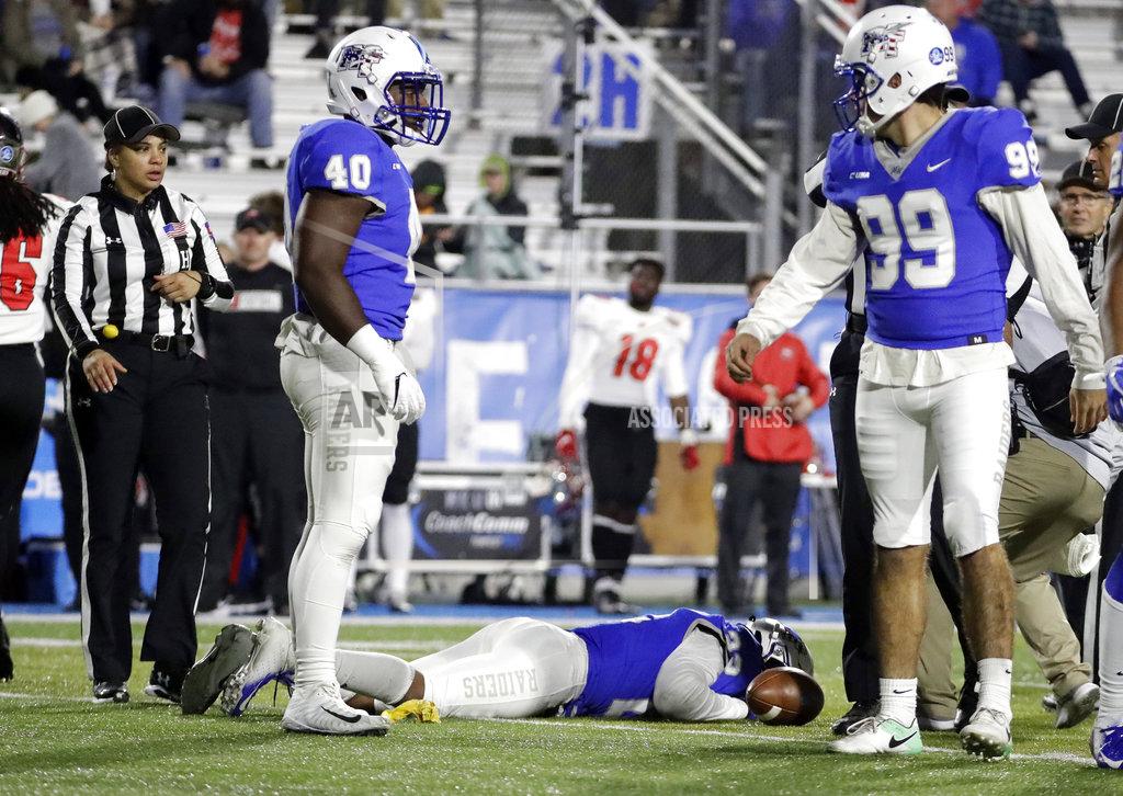 Mark Humphrey Middle Tennessee defensive back Cordell Hudson (22) lies on the field after being injured during the second half of the team's NCAA college football game against Western Kentucky on Friday, Nov. 2, 2018, in Murfreesboro, Tenn. Middle Tennessee won 29-10. (AP Photo/Mark Humphrey)