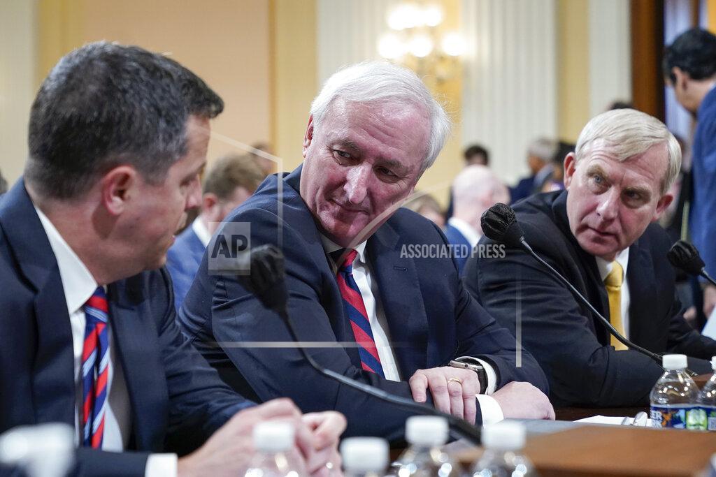 Jacquelyn Martin Steven Engel, former Assistant Attorney General for the Office of Legal Counsel, from left, Jeffrey Rosen, former acting Attorney General, and Richard Donoghue, former acting Deputy Attorney General, talk during a break as the House select committee investigating the Jan. 6 attack on the U.S. Capitol continues to reveal its findings of a year-long investigation, at the Capitol in Washington, Thursday, June 23, 2022. (AP Photo/Jacquelyn Martin)
