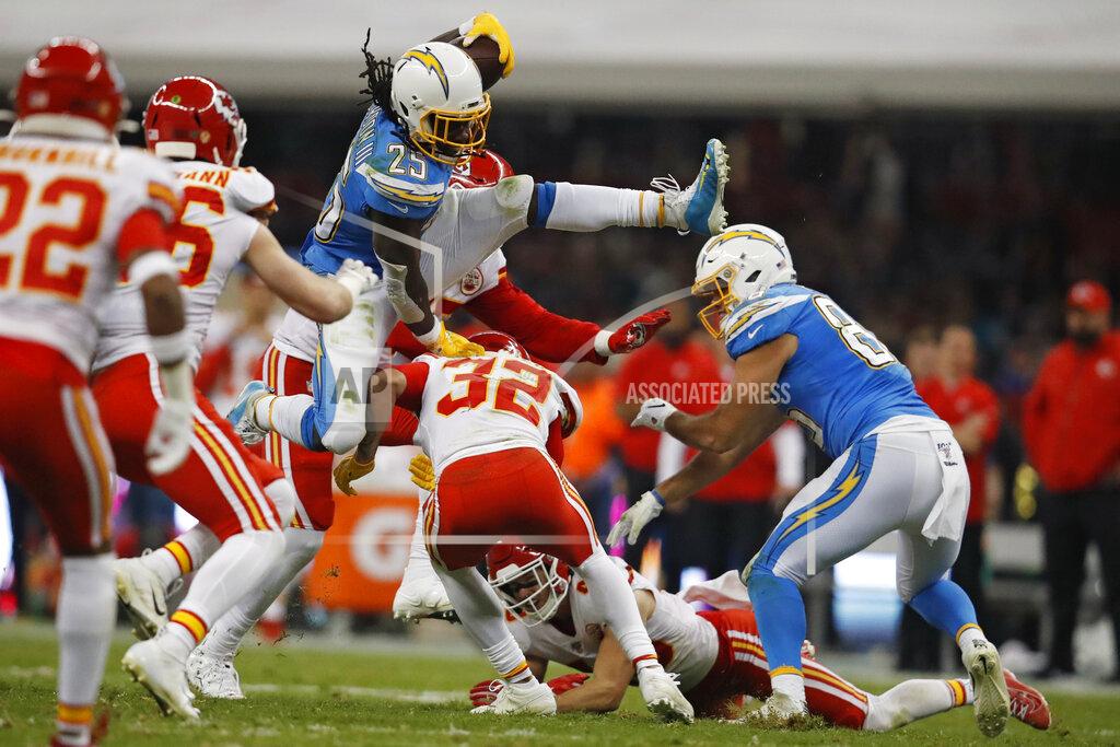 Eduardo Verdugo Los Angeles Chargers running back Melvin Gordon leaps over Kansas City Chiefs strong safety Tyrann Mathieu during the first half of an NFL football game Monday, Nov. 18, 2019, in Mexico City. (AP Photo/Eduardo Verdugo)