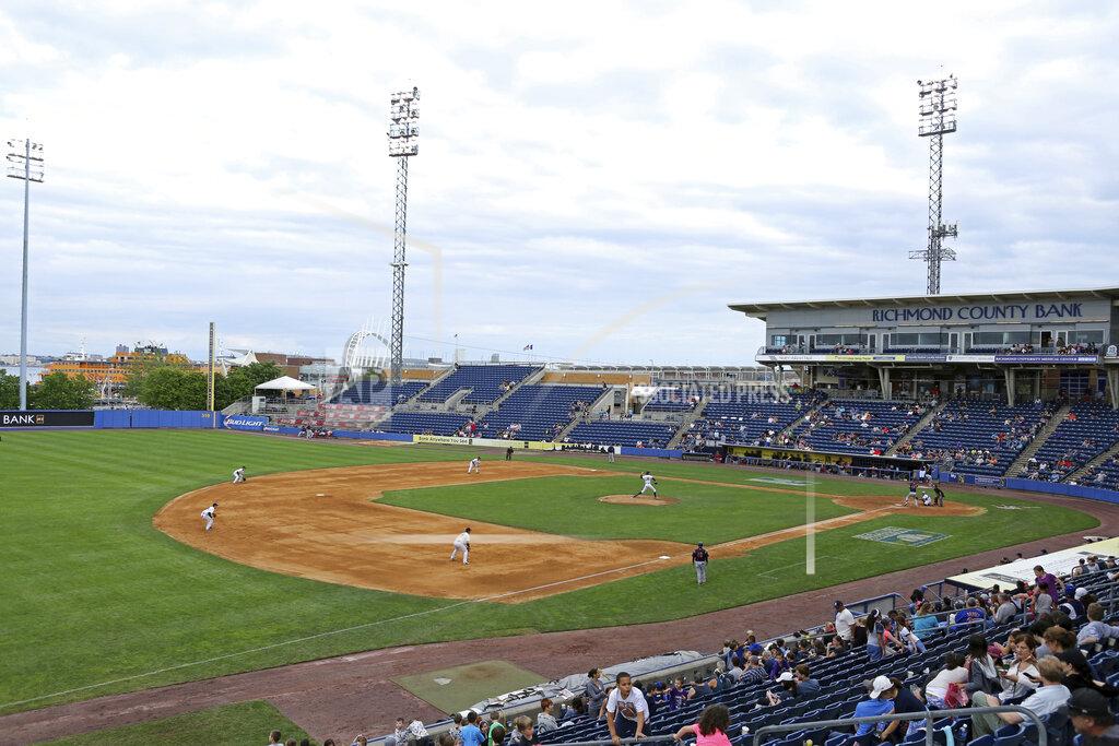 Gregory Payan FILE - This Sunday, June 28, 2015, file photo shows an overall view of the Staten Island Yankees in action against the State College Spikes at Richmond County Bank Ballpark during a minor league baseball game in Staten Island, N.Y. The owners of the Staten Island Yankees announced in a statement Thursday, Dec. 3, 2020, that with “great regret, we must cease operations.” They also said they were suing the New York Yankees and Major League Baseball “to hold those entities accountable for false promises” that they would always keep the team as a farm club. (AP Photo/Gregory Payan, File)
