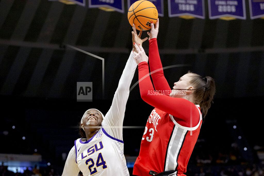Matthew Hinton LSU center Faustine Aifuwa (24) blocks the shot of Ohio State forward Rebeka Mikulasikova (23) during the first half of a college basketball game in the second round of the NCAA tournament, Monday, March 21, 2022, in Baton Rouge, La. (AP Photo/Matthew Hinton)