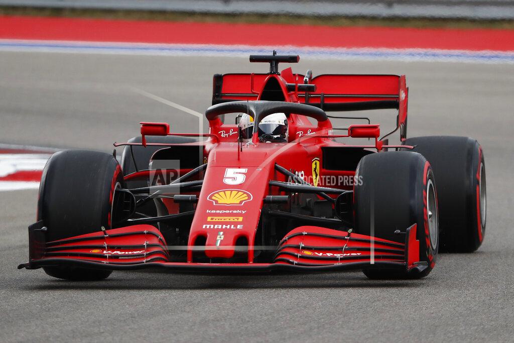 Maxim Shemetov Ferrari driver Sebastian Vettel of Germany steers his car during the qualification for the upcoming Russian Formula One Grand Prix, at the Sochi Autodrom circuit, in Sochi, Russia, Saturday, Sept. 26, 2020. The Russian Formula One Grand Prix will take place on Sunday. (Maxim Shemetov/Pool Photo via AP)