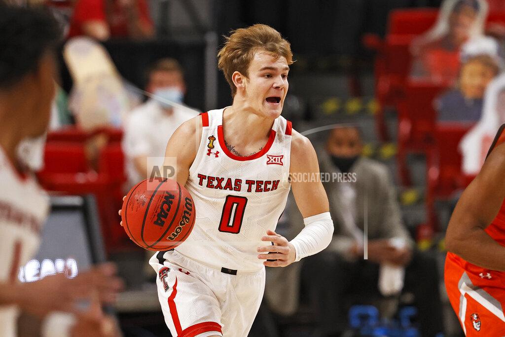 Brad Tollefson Texas Tech's Mac McClung (0) dribbles the ball down the court during the first half of an NCAA college basketball game against Sam Houston State, Friday, Nov. 27, 2020, in Lubbock, Texas. (AP Photo/Brad Tollefson)
