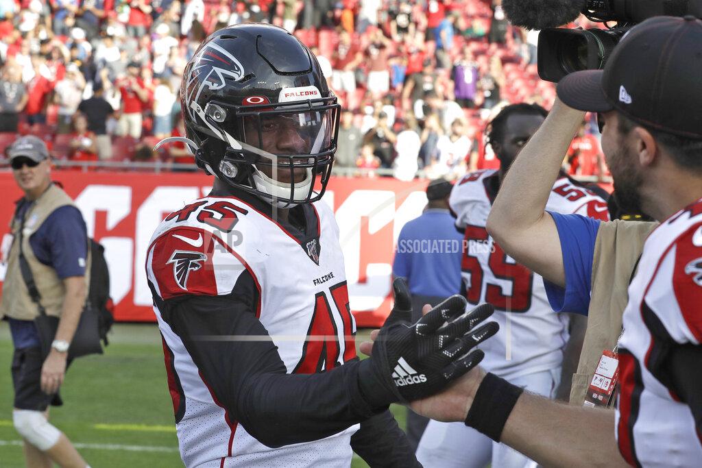 Chris O'meara Atlanta Falcons linebacker Deion Jones (45) celebrates with teammates after scoring the game-winning touchdown against the Tampa Bay Buccaneers during overtime of an NFL football game Sunday, Dec. 29, 2019, in Tampa, Fla. (AP Photo/Chris O'Meara)